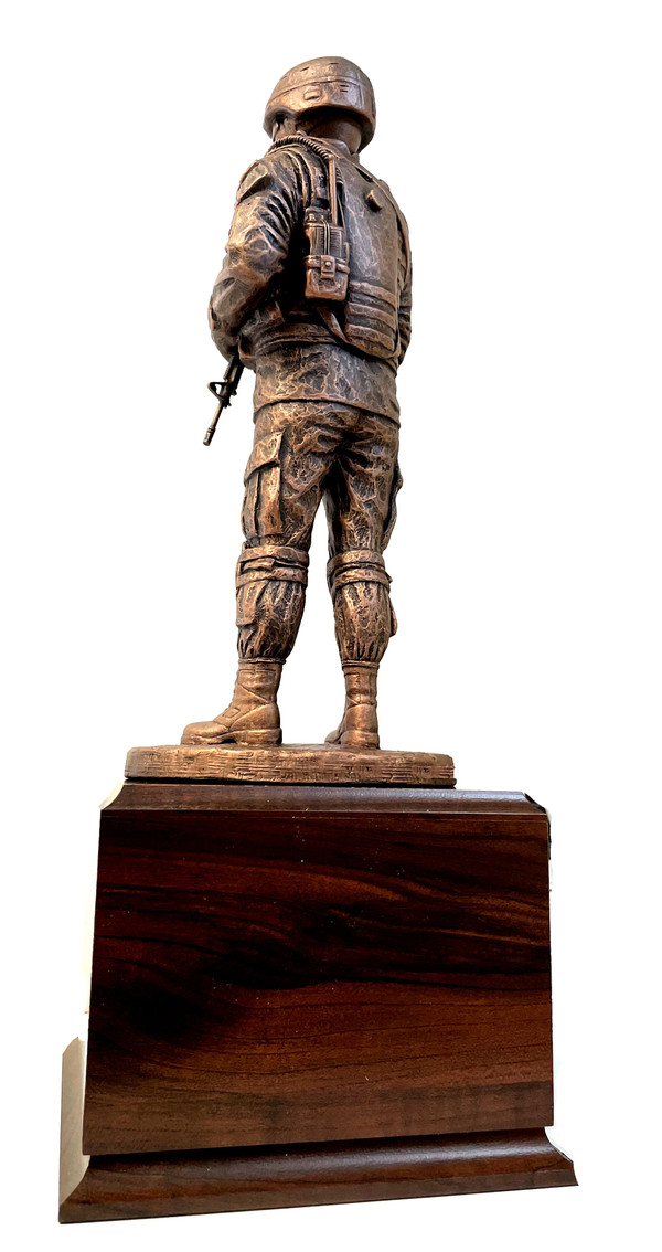 17-1/2" Total height awesome warrior male military statue mounted on a 6-1/5" long by 6-1/2 x wide by 5" high laminated cherry base. Coin not included. "Mission Ready" will always be an excellent choice. Engraving area is 5-1/2 by 3-1/2".