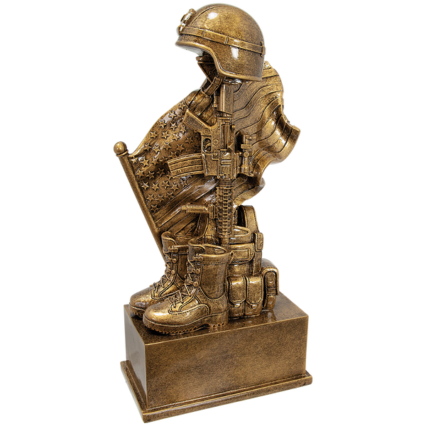 This Military Award is a tribute to a fallen service member, featuring a US Flag, a rifle, a helmet, and boots. It is a Military Remembrance Gift that stands 8-3/4 inches tall. It is a small item that can fit in a small space, but it demands a lot of respect. It has a high level of detail. It also has an engraving plate that measures 3 inches by 1 inch.