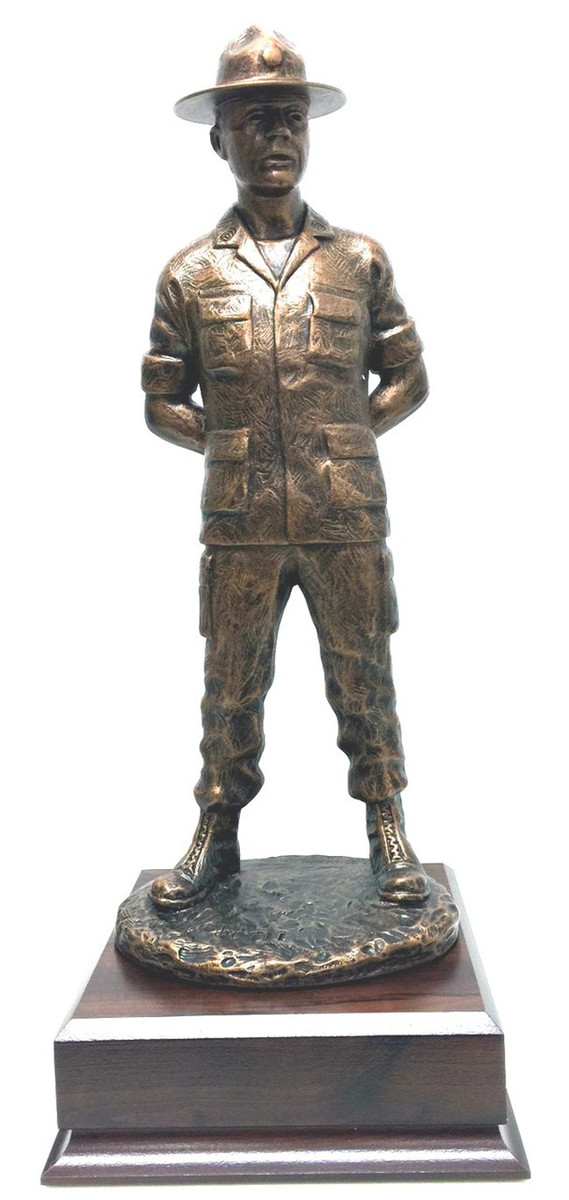 16 inches total height Army or Air Force Drill Sergeant military statue mounted on a 6-1/2 inches wide by 6-1/2 inches deep by 2-1/2 inches high laminated cherry base.