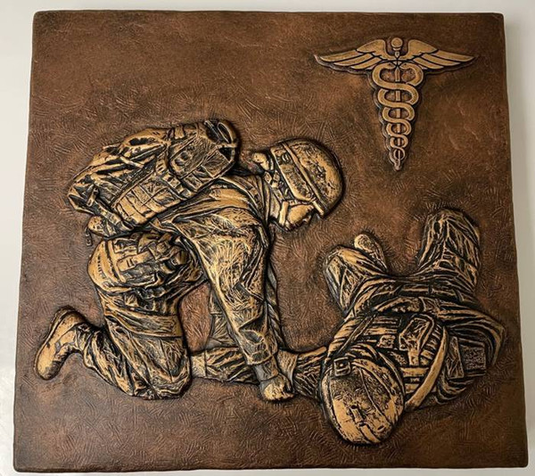 Female Soldier Medic Wall Plate, 8.5" x 8" x 1" with mounting hanger. Features caduceus symbol and complimentary engraving.