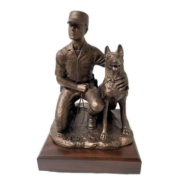 U.S. Army Dog Handler Male Military Statue K9, 12" tall mounted on 6 inches long by 6 inches wide by 2 inches tall, laminated cherry base.  Engraving plate is 5" wide x 1" high, with free engraving.