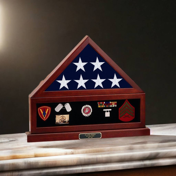 This is a flag display case made of Appalachian hardwood with a Queen Anne cherry finish and a base. It comes with free engraving and accommodates a 5' by 9' memorial flag. The quality and craftsmanship of this case are unmatched. It is proudly made in the USA.