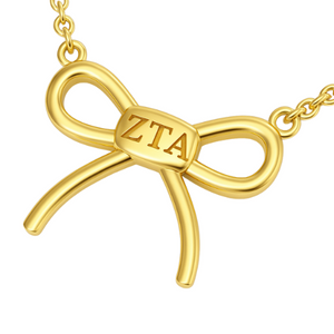 Zeta Tau Alpha "ZTA" Bow Necklace Zeta Tau Alpha "ZTA" Bow Necklace