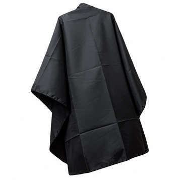 Black hairdressing cutting cape for professional salon and barber services.