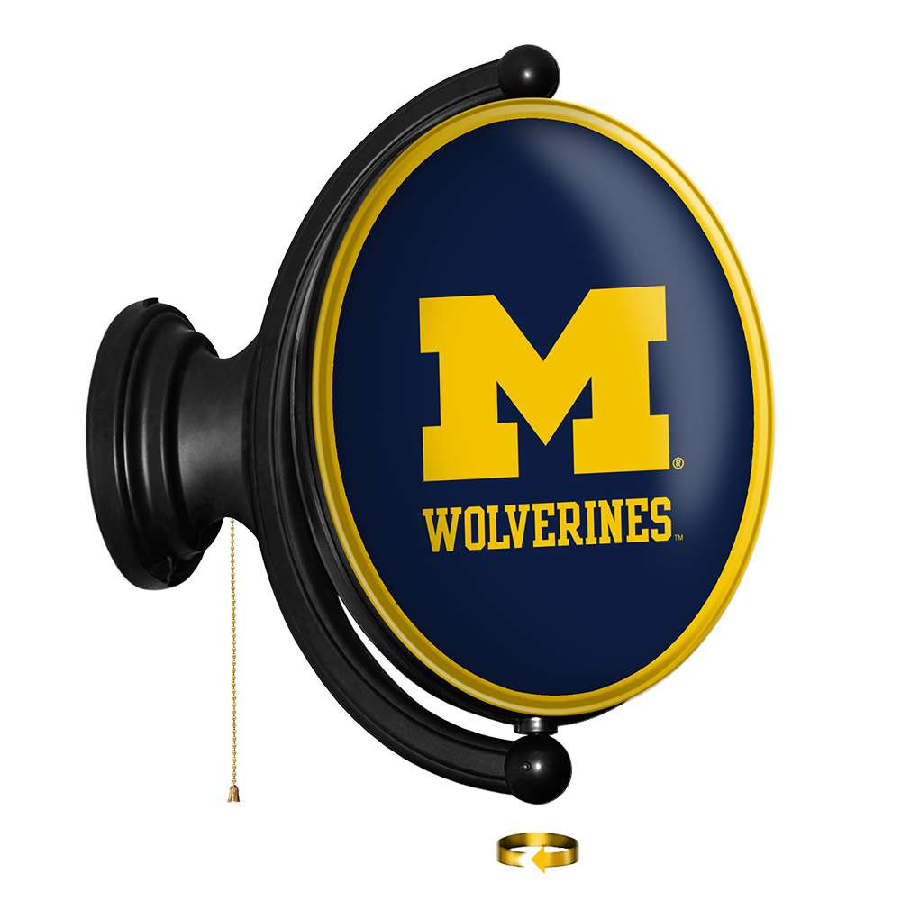 Michigan Wolverines Original Oval Rotating Lighted Wall Sign - Blue | The Fan-Brand | NCMICH-125-01B