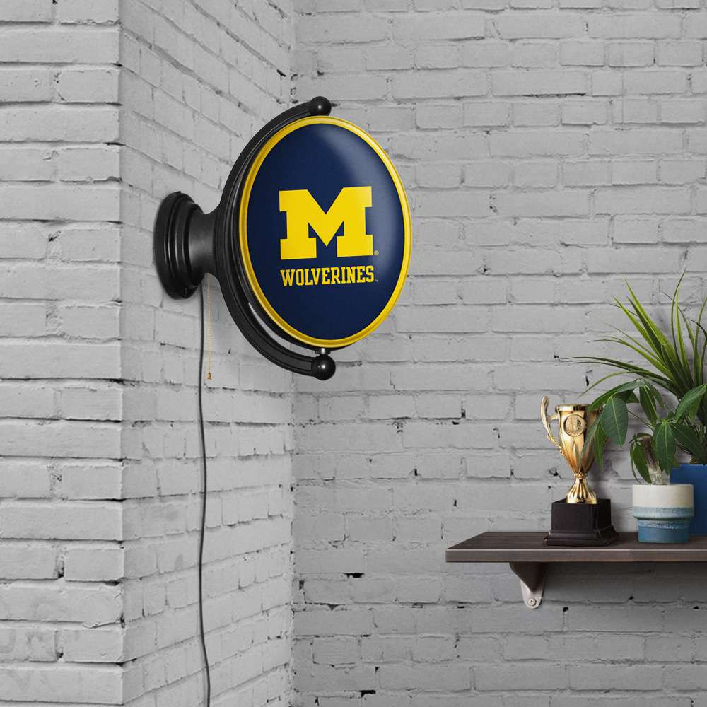 Michigan Wolverines Original Oval Rotating Lighted Wall Sign - Blue