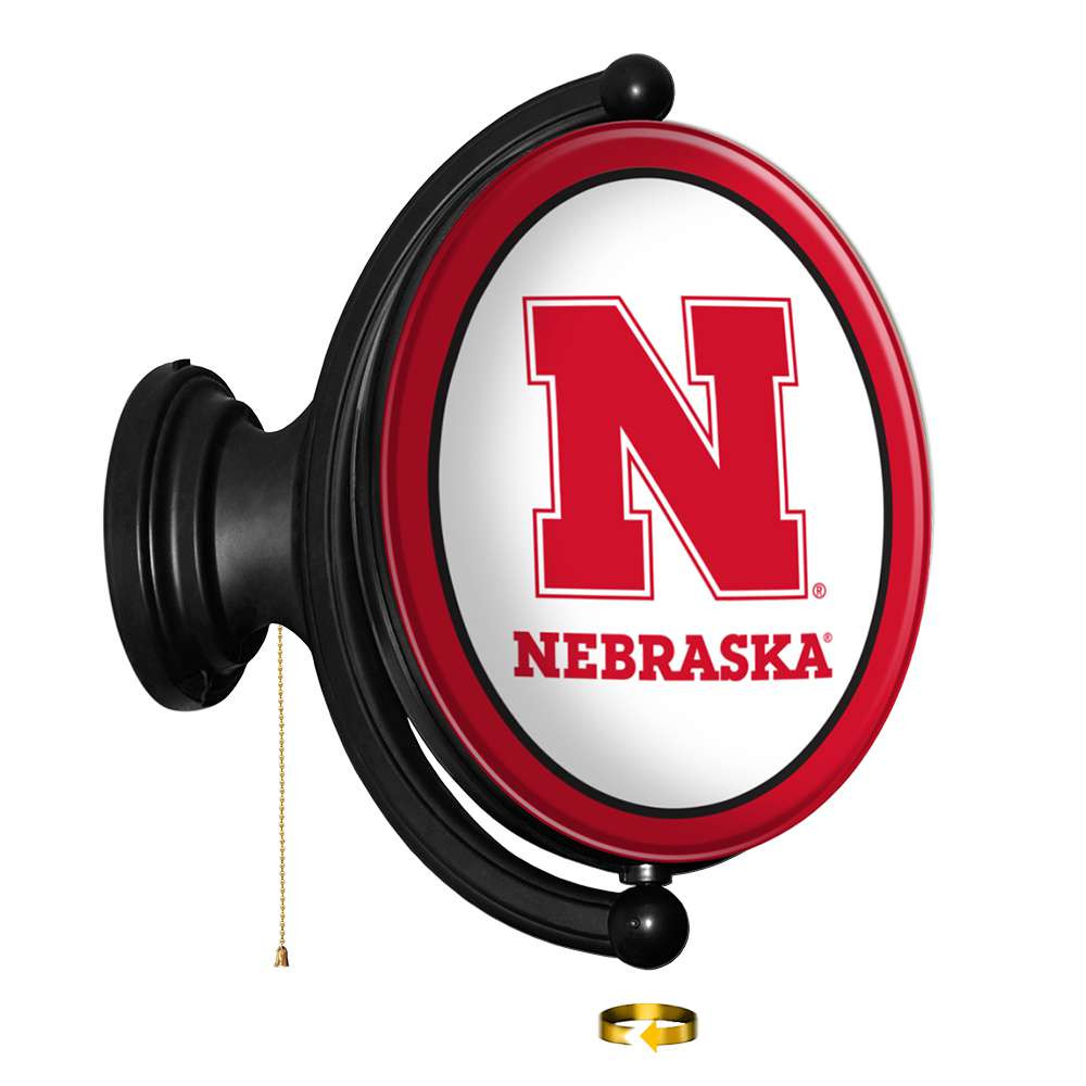 Nebraska Cornhuskers Huskers - Original Oval Rotating Lighted Wall Sign | The Fan-Brand | NCNEBR-125-01