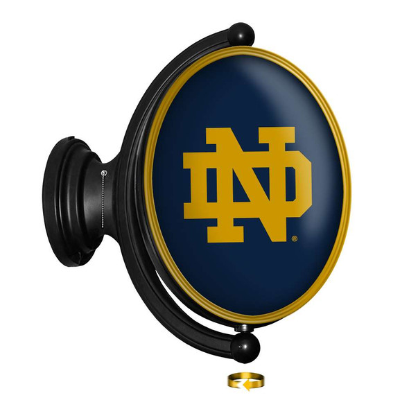 Notre Dame Fighting Irish: Original Oval Rotating Lighted Wall Sign - Irish Blue | The Fan-Brand | NCNTRD-125-01A