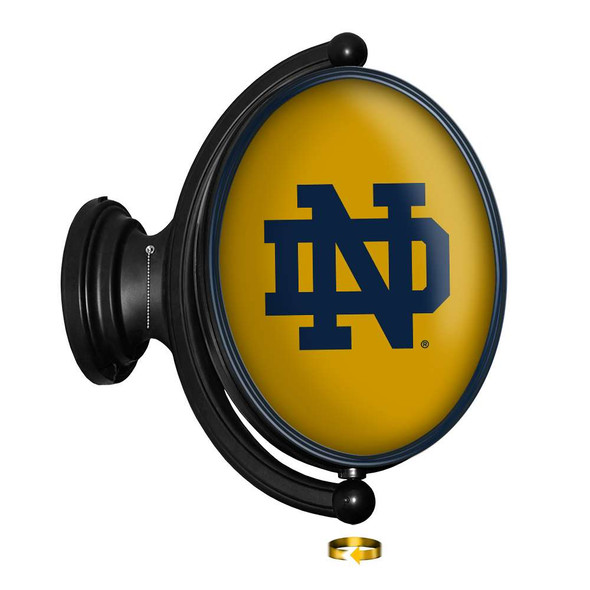 Notre Dame Fighting Irish: Original Oval Rotating Lighted Wall Sign - Irish Gold | The Fan-Brand | NCNTRD-125-01B