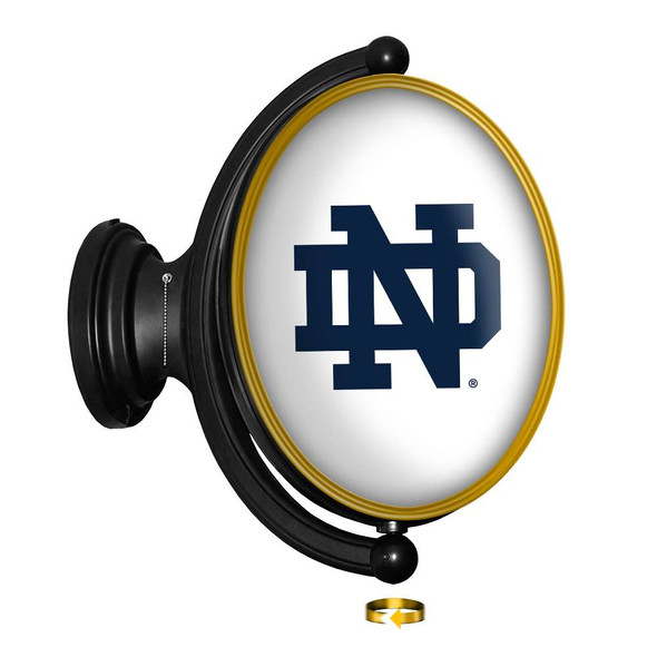 Notre Dame Fighting Irish: Original Oval Rotating Lighted Wall Sign - White / Irish Gold Trim | The Fan-Brand | NCNTRD-125-01D