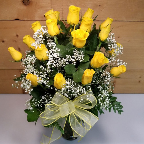 24 Yellow Roses Vased Bouquet (SCF8005) by Savilles Country Florist.  Flower and Plant delivery to Orchard Park, NY and the surrounding area including same day delivery to Hamburg, West Seneca, East Aurora, Blasdell and Buffalo NY   
