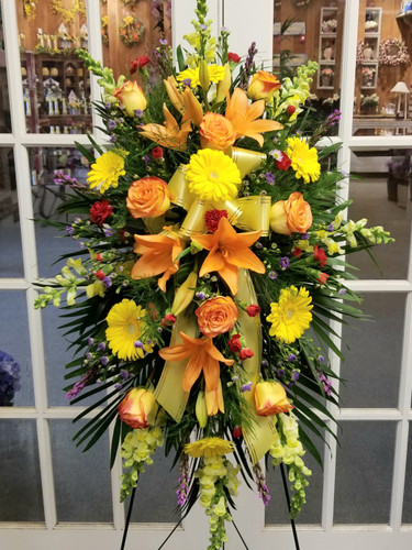 Bright Sympathy Standing Spray by Savilles Country Florist. Flower delivery to Orchard Park, Hamburg, West Seneca, East Aurora, Buffalo, NY and surrounding suburbs.