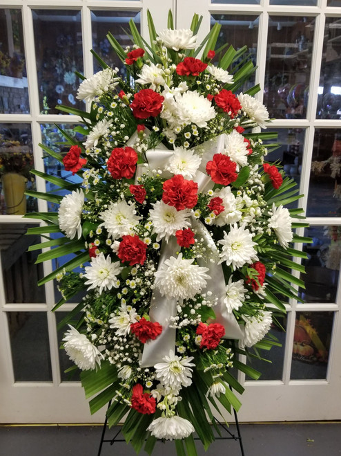 Red & White Sympathy Standing Spray by Savilles Country Florist. Flower delivery to Orchard Park, Hamburg, West Seneca, East Aurora, Buffalo, NY and surrounding suburbs.