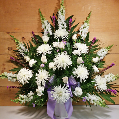 Lavender & White Sympathy Arrangement  by Savilles Country Florist. Flower delivery to Orchard Park, Hamburg, West Seneca, East Aurora, Buffalo, NY and surrounding suburbs.