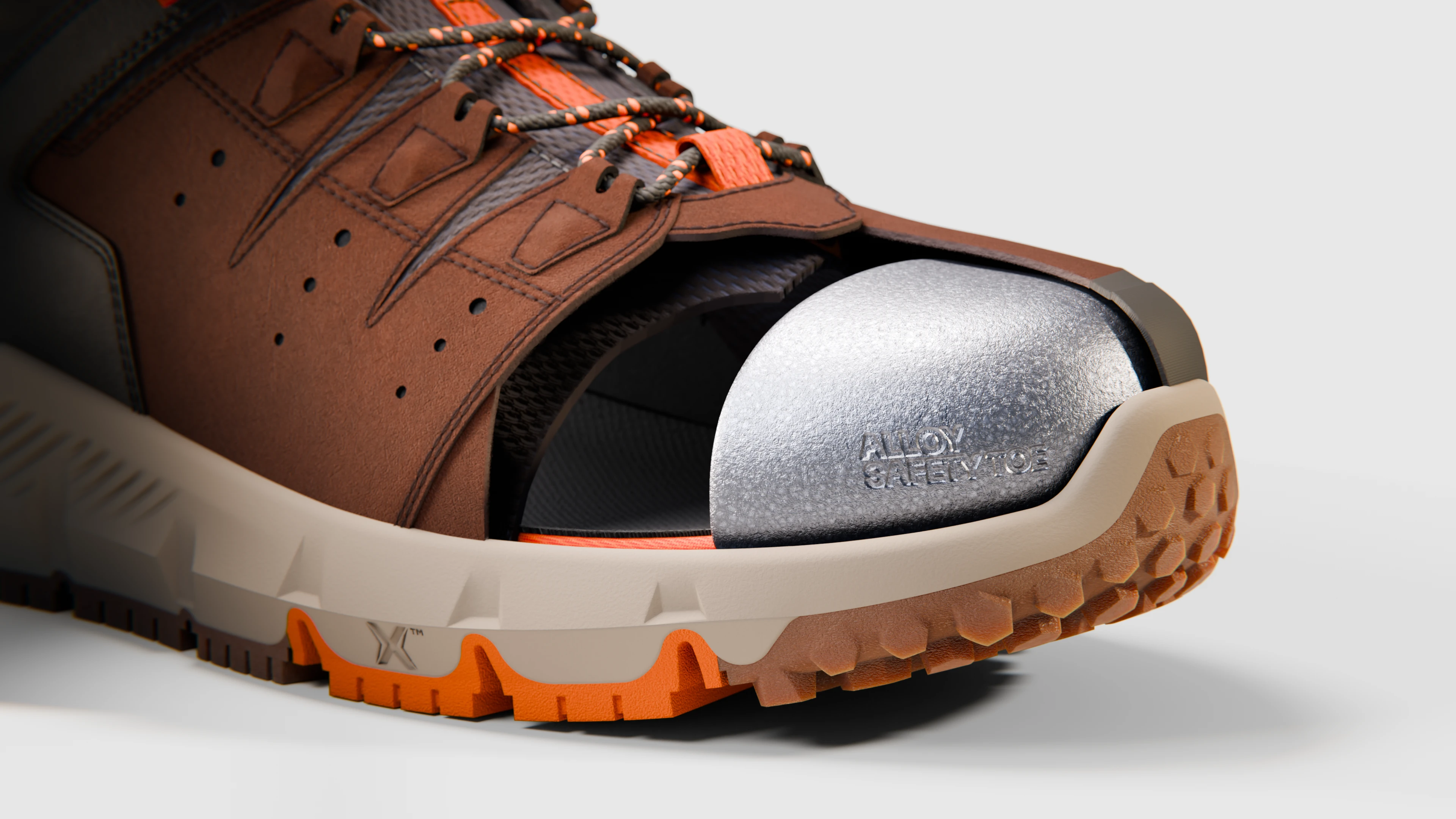 Cutaway view of the alloy safety toe cap inside a brown Timberland PRO work shoe