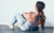 wave duo vibrating roller in use under lower back for targeting smaller muscles
