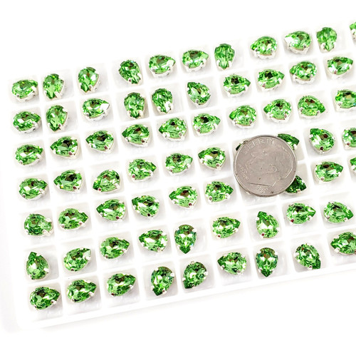 Pear stone 8x6mm, Peridot, w/Silver plated Claw setting Pear stone 8x6mm, Peridot, w/Silver plated Claw setting