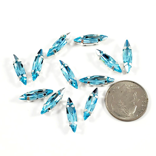 Slim Navette Stone 4x15mm Dk Aqua w/Silver claw setting Slim Navette Stone 4x15mm Dk Aqua w/Silver claw setting