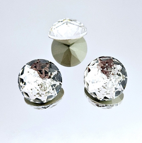Crystal Dome Round Stone, 18mm. Pointed back and plated. Crystal Clear. Crystal Dome Round Stone, 18mm. Pointed back and plated. Crystal Clear.