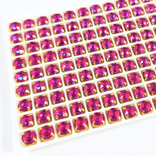 6mm chaton stone in gold claw setting. Fuchsia Ultra AB. 6mm chaton stone in gold claw setting. Fuchsia Ultra AB.