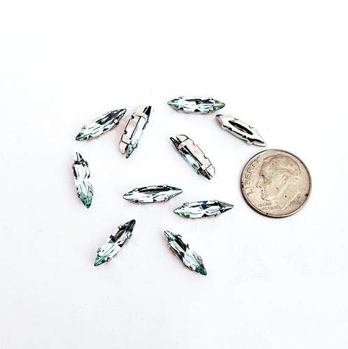 Slim Navette Stone 4x15mm Lt Turquoise in silver plated claw setting