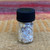 Silver Flakes In Bottle