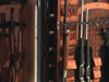 Browning safe interior with guns, leather pockets, and LED lighting.