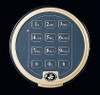 Circular electronic keypad with numbers 0-9, , #, and letters.