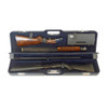 Navy Negrini shotgun case with two disassembled shotguns and accessories.