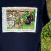 Navy blue cotton tee with a hunting-themed stamp graphic featuring a deer, turkey, and ducks.