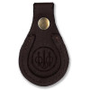 Dark brown leather Beretta barrel rest with brass snap and embossed logo.