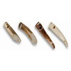 Four buckhorn whistles, varying colors, curved shape, with holes.