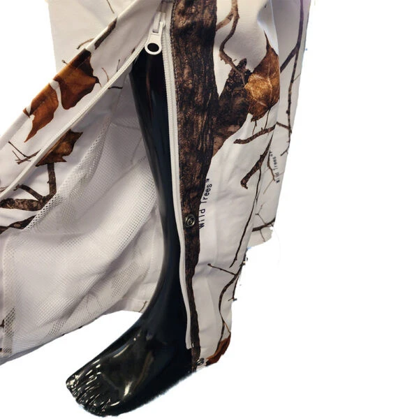 Wildfowler waterproof hunting bib in Wildtree Snow camo on a mannequin, showing the side zipper and mesh lining.