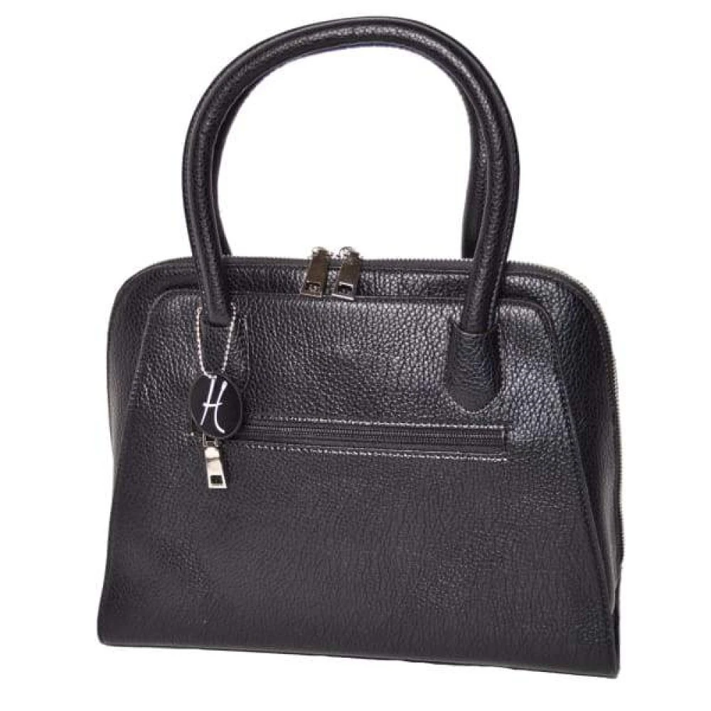 Black textured leather handbag with rounded handles, a zipper closure, and a circular charm.