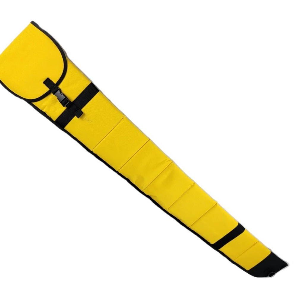 Yellow Bob Allen gun sleeve with black trim and buckle closure, angled view