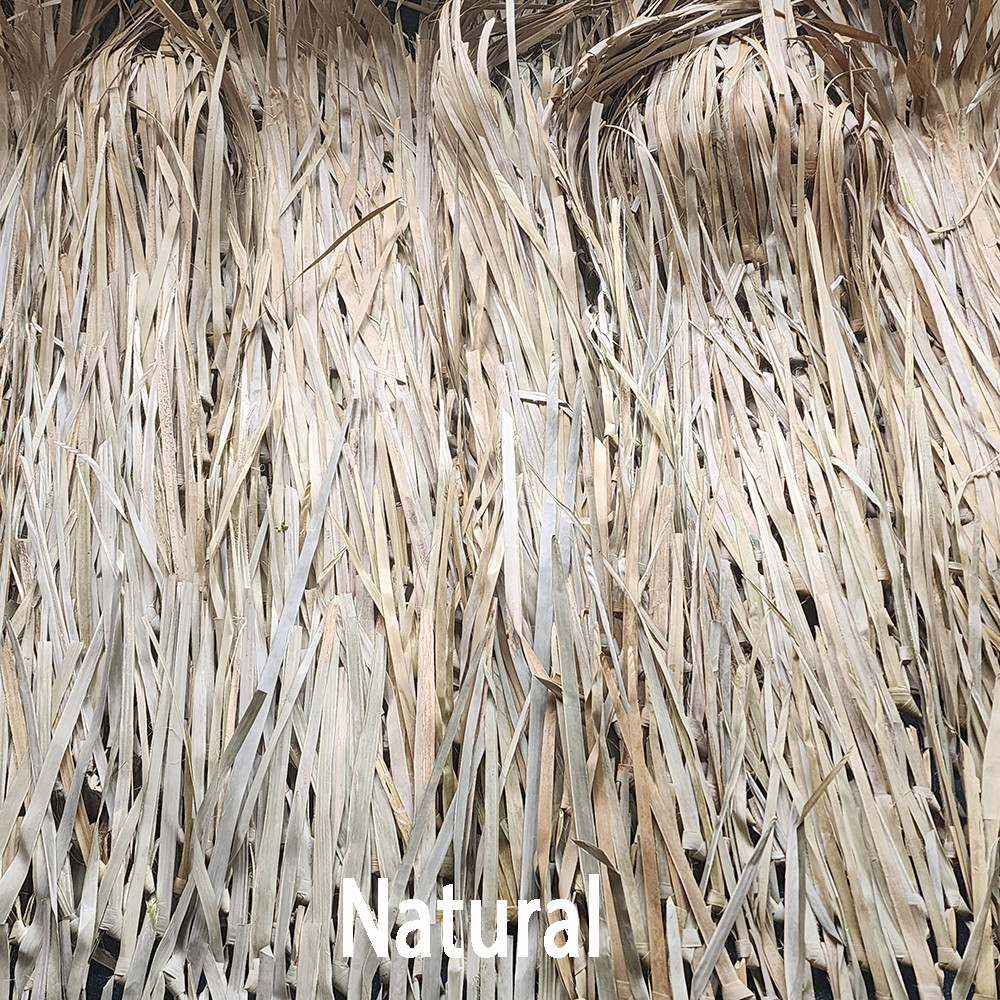 Close-up of natural palm leaf grass matting in tan and beige tones.