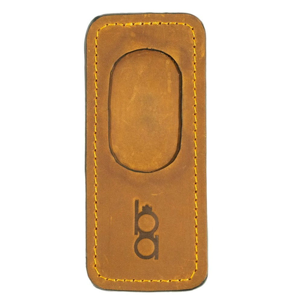 Tan leather Bob Allen magnetic barrel protector, yellow stitching, oval cutout, logo.