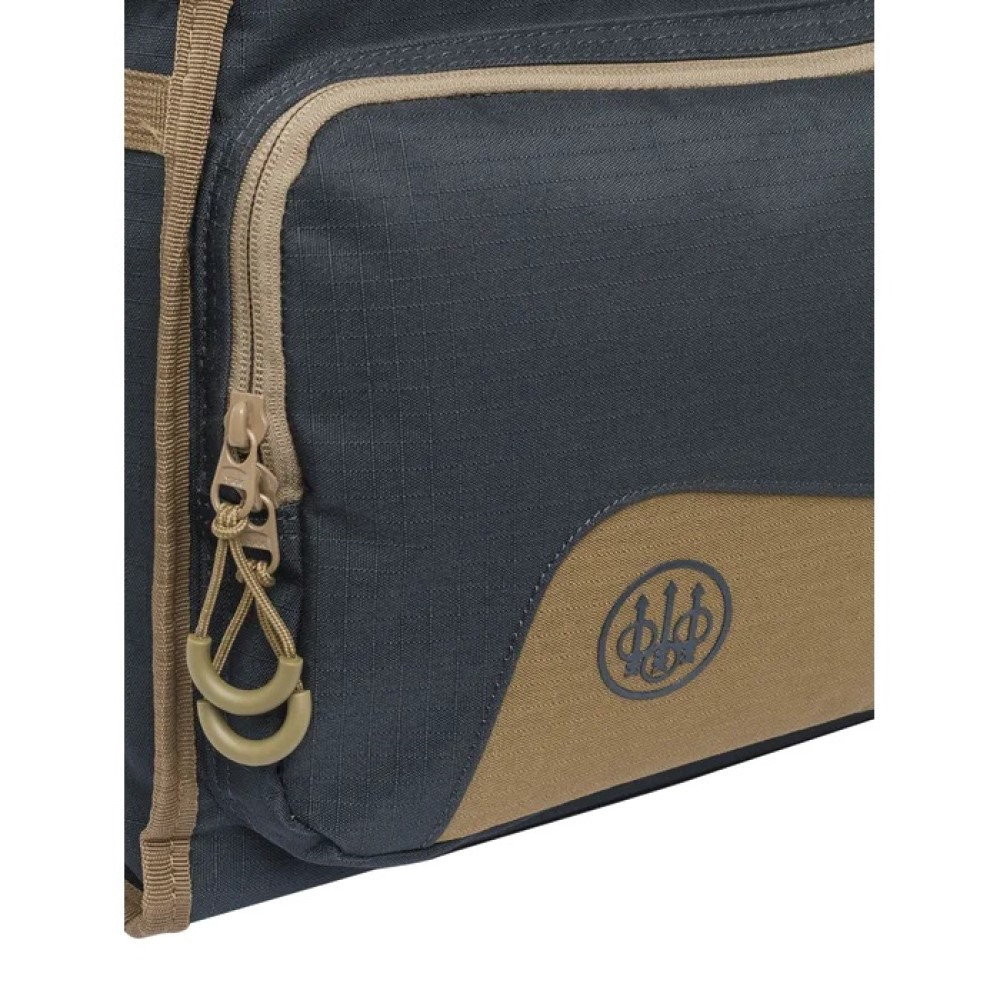 Ebony and otter Beretta cartridge bag. Dark gray and tan fabric with zipper and logo detail.