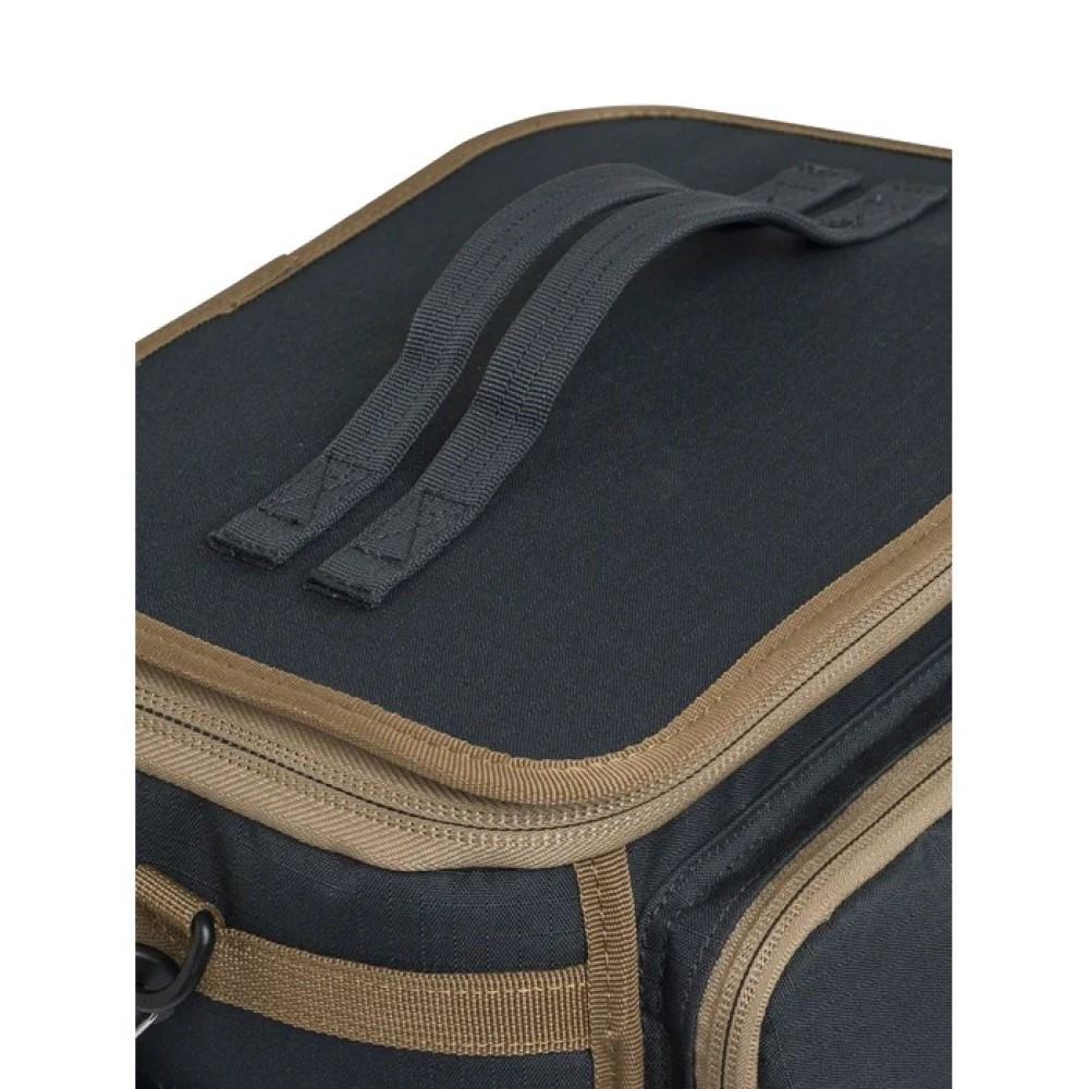 Black and tan cartridge bag, top handle, zippers, durable material, close-up view.