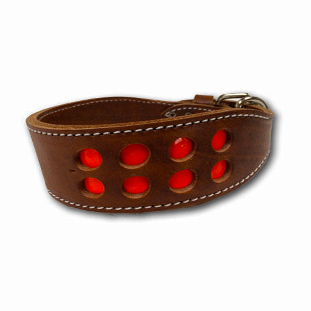 Brown leather dog collar with orange reflective spots, white stitching, and silver hardware.