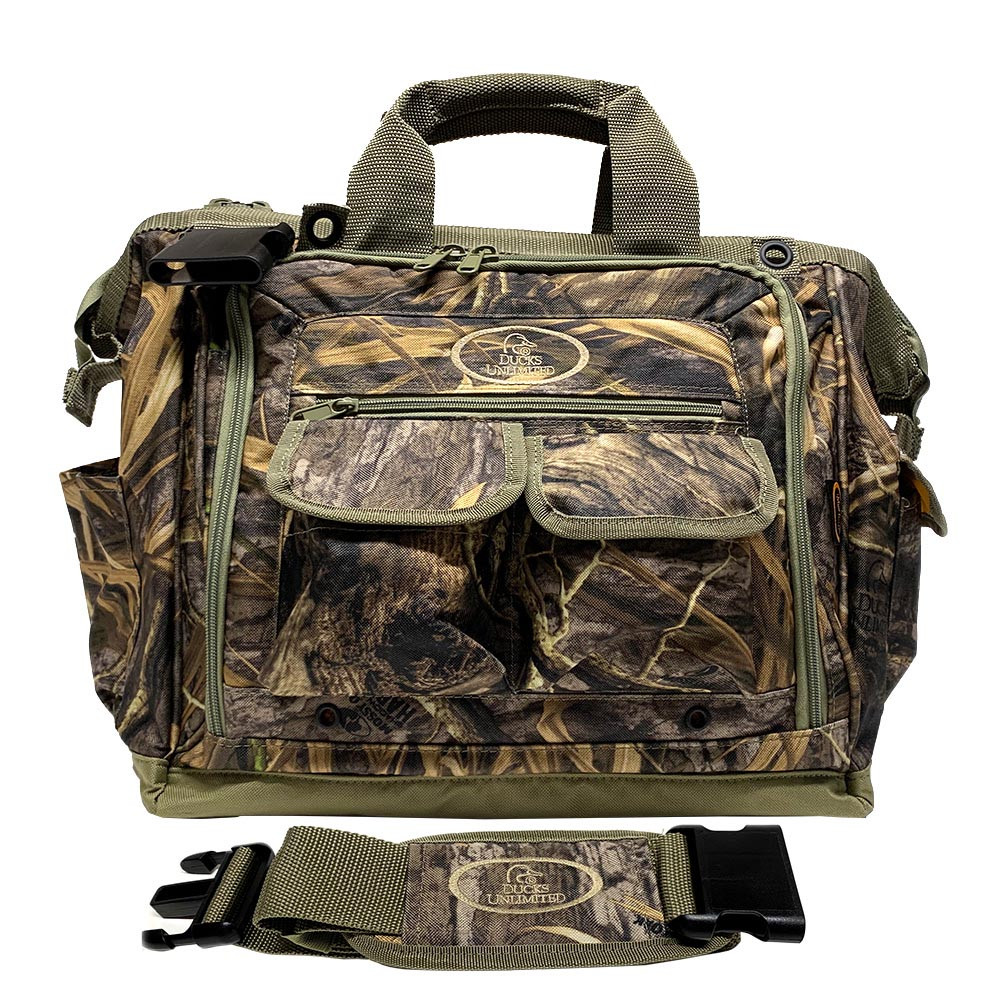 Camo Mud River Dog Handlers Bag with green accents, shoulder strap, and Ducks Unlimited logo.