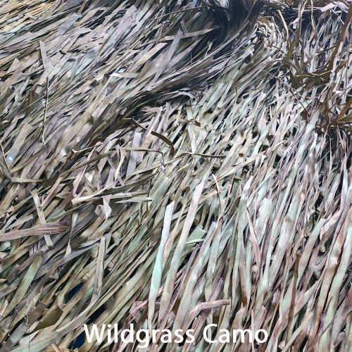 Close-up of Wildgrass Camo palm leaf mat with green and brown tones.