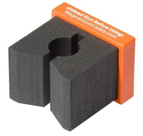 Black foam gun caddy with orange plastic top; angled view.