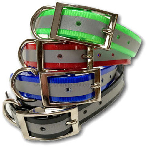 Pile of colorful dog collars with reflective strips and metal buckles. Green, red, blue, and black.