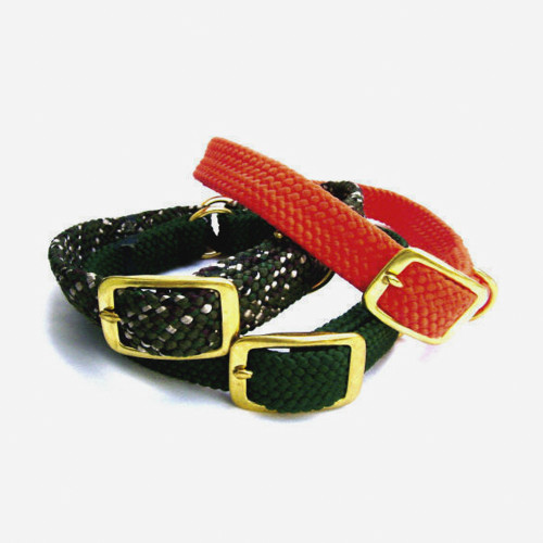 Green and orange braided dog collars with brass buckles, angled view.