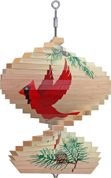 The image features a vibrant Cardinal outdoor wind spinner composed of multiple layers of pointed, petal-like blades being able to move in the wind.