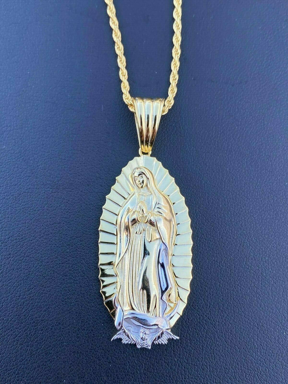 1981 rectangular Mother Mary pendant in gold