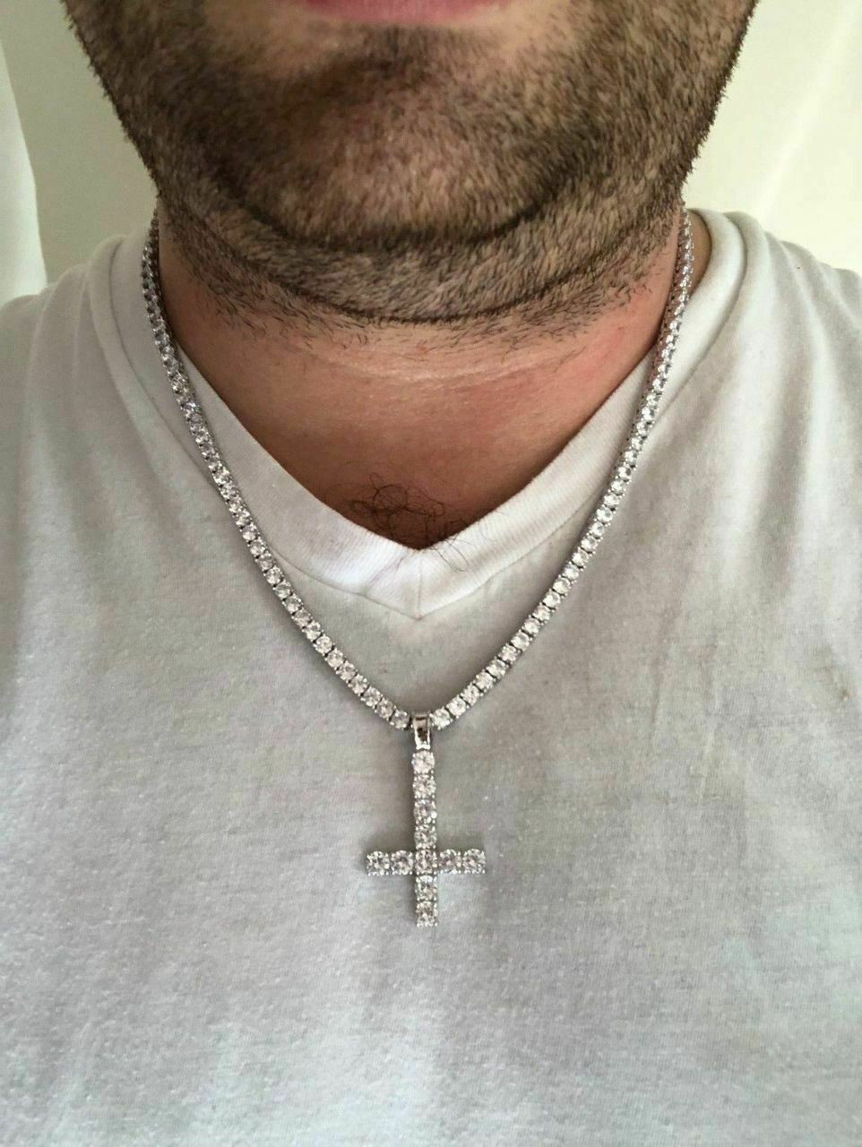 Iced out store upside down cross