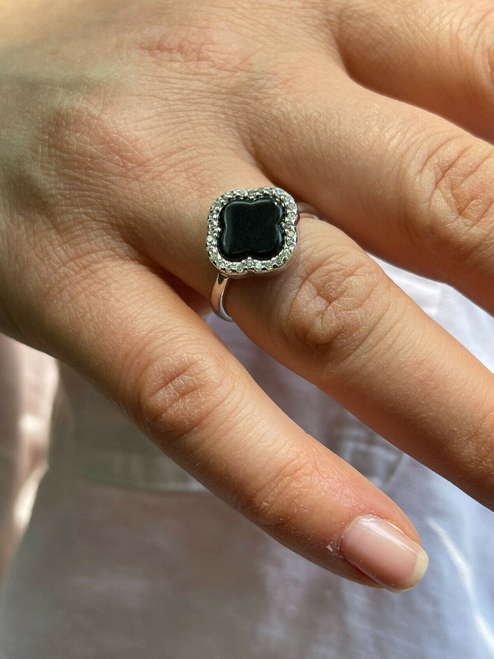 Sterling silver, black onyx and diamond ring