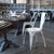 Distressed White Metal Indoor-Outdoor Stackable Chair